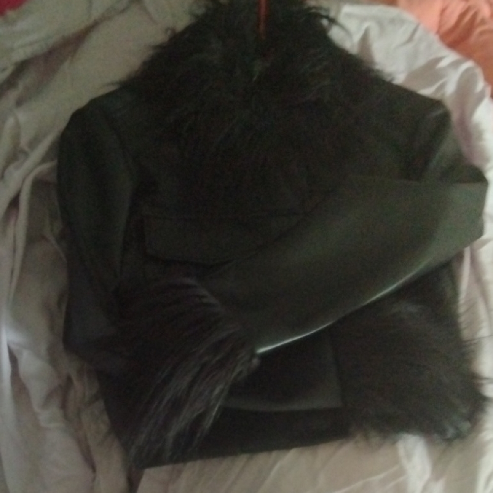Sleek Black Leather Jacket with Textured Sheen